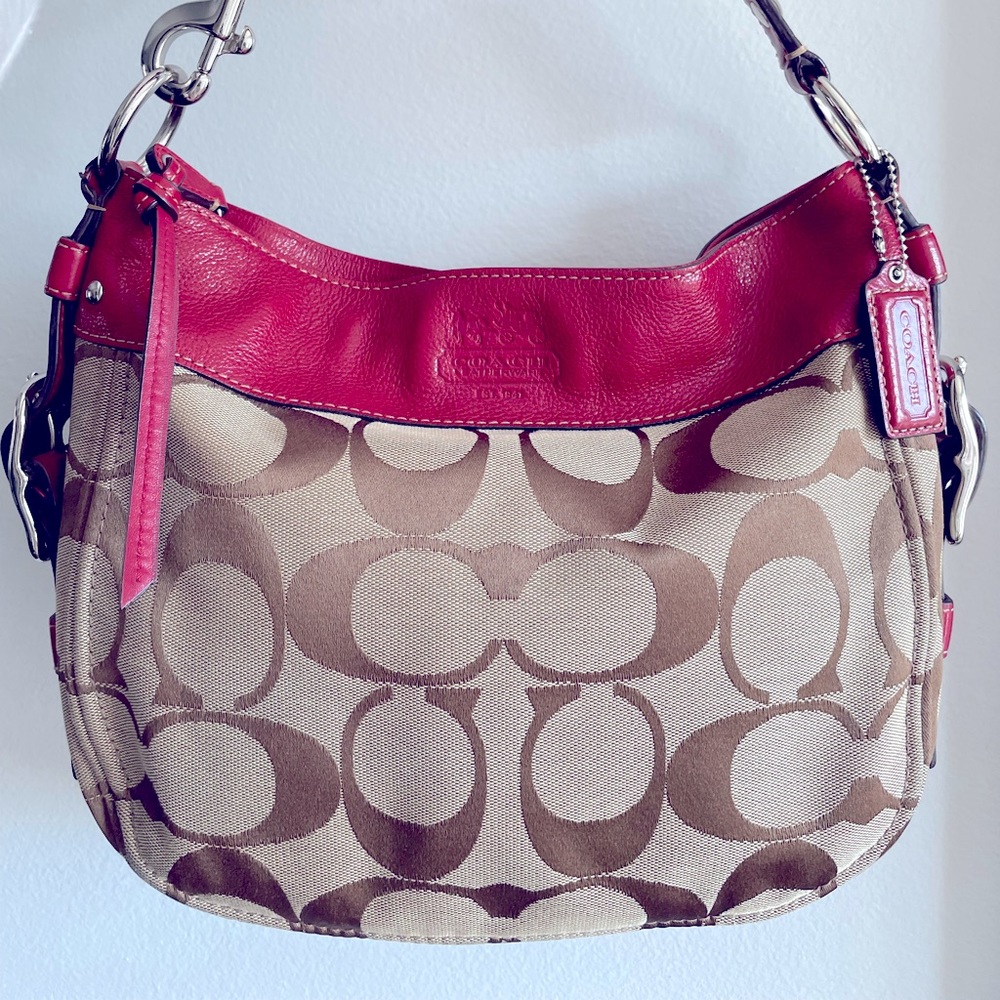 Coach saddle bag brown signature canvas; red leather trim
